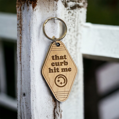 That Curb Hit Me Motel Keychain